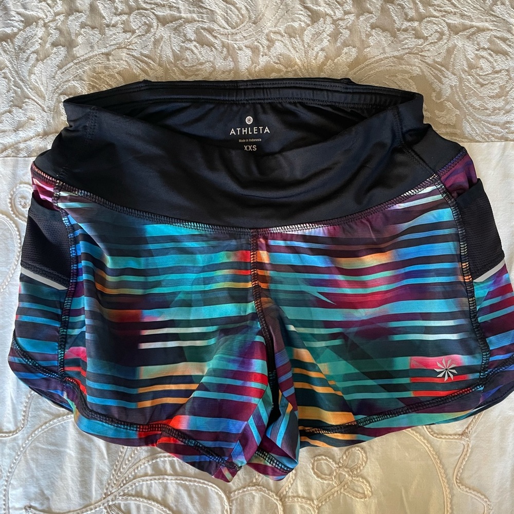 Brand New Athleta running shorts with pockets